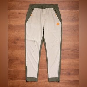 New Balance Men’s Track Pants in Olive green color size M